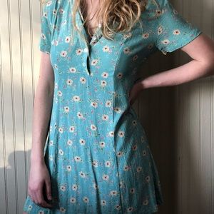 a cute teal summer dress with pink flowers